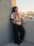 DAXUEN Fierce cat graphic V-neck t-shirt — model photo