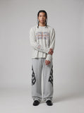 DAXUEN light grey oversized flag long sleeve top — model photo