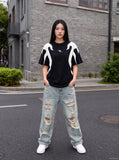 DAXUEN black oversized flame-graphic panel T-shirt — model photo