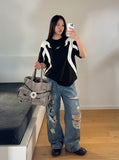 DAXUEN black oversized flame-graphic panel T-shirt — model photo