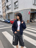 DAXUEN dark grey wide-leg shorts with flame graphics — model photo