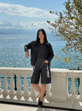 DAXUEN dark grey wide-leg shorts with flame graphics — model photo