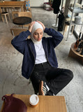 DAXUEN Solid black flared cargo pants — model photo