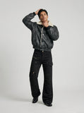 DAXUEN Solid black flared cargo pants — model photo