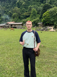 DAXUEN black relaxed fit flared pants — model photo