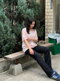 DAXUEN black relaxed fit flared pants — model photo