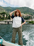 DAXUEN olive green flared cargo pants — model photo