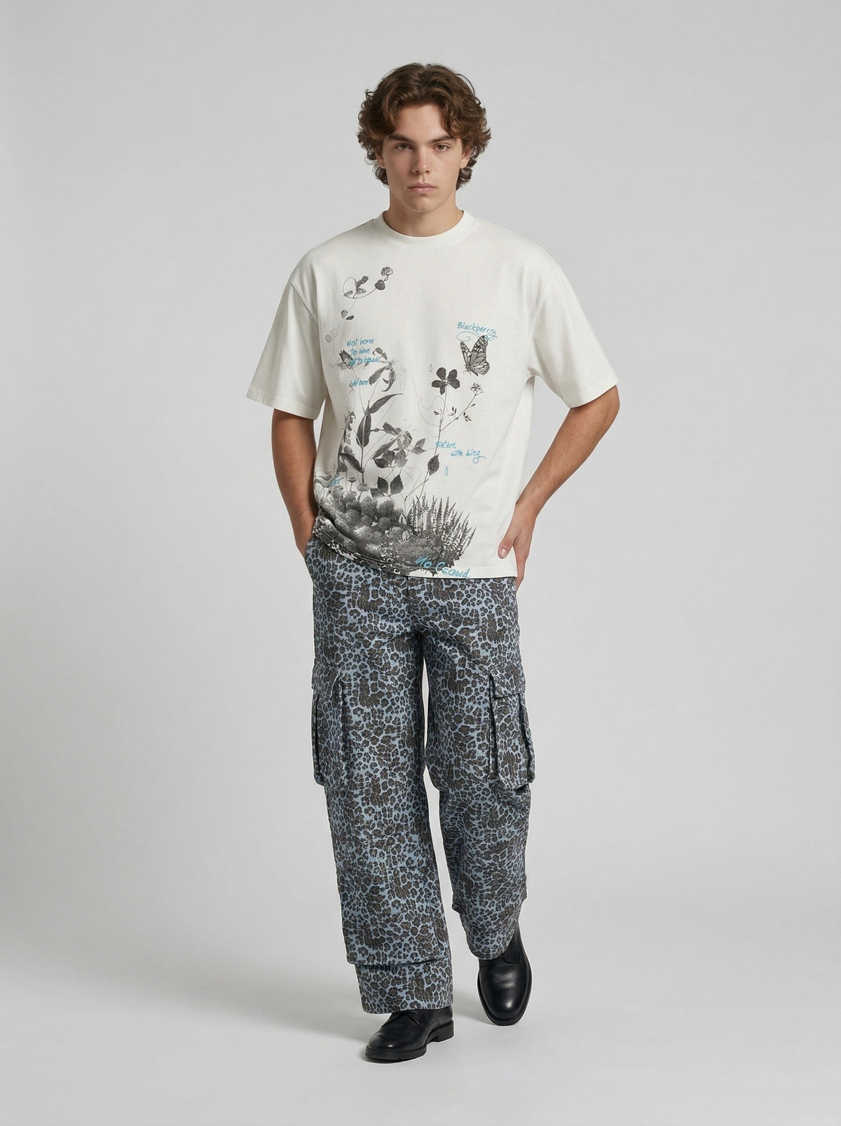 DAXUEN Floral butterfly printed short-sleeved T-shirt — model photo