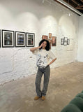 DAXUEN Floral butterfly printed short-sleeved T-shirt — model photo