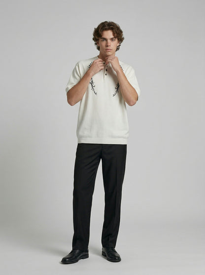 DAXUEN Floral embroidered short-sleeved knitted polo shirt — model photo