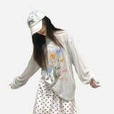 DAXUEN Floral graphic long-sleeve top