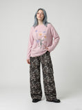 DAXUEN Floral graphic long-sleeve top — model photo