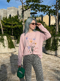 DAXUEN Floral graphic long-sleeve top — model photo