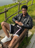 DAXUEN Women's flowy A-line layered shorts — model photo