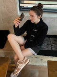 DAXUEN Women's flowy A-line layered shorts — model photo