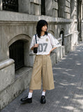DAXUEN dark grey cropped wide-leg trousers — model photo