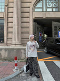 DAXUEN Long sleeve crew neck top with bunny print — model photo