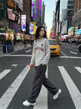 DAXUEN Light grey heathered long-sleeved Henley shirt — model photo