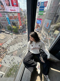 DAXUEN Long-sleeved Henley top with graphic design — model photo