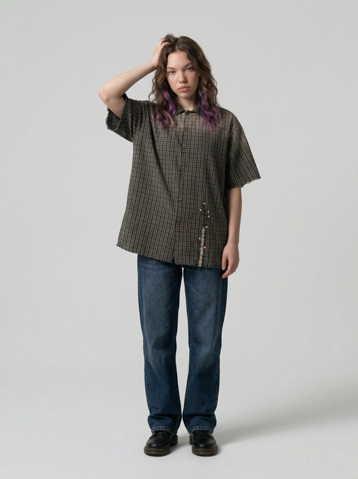 DAXUEN Oversized plaid button-up shirt with frayed edges — model photo