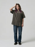 DAXUEN Oversized plaid button-up shirt with frayed edges — model photo