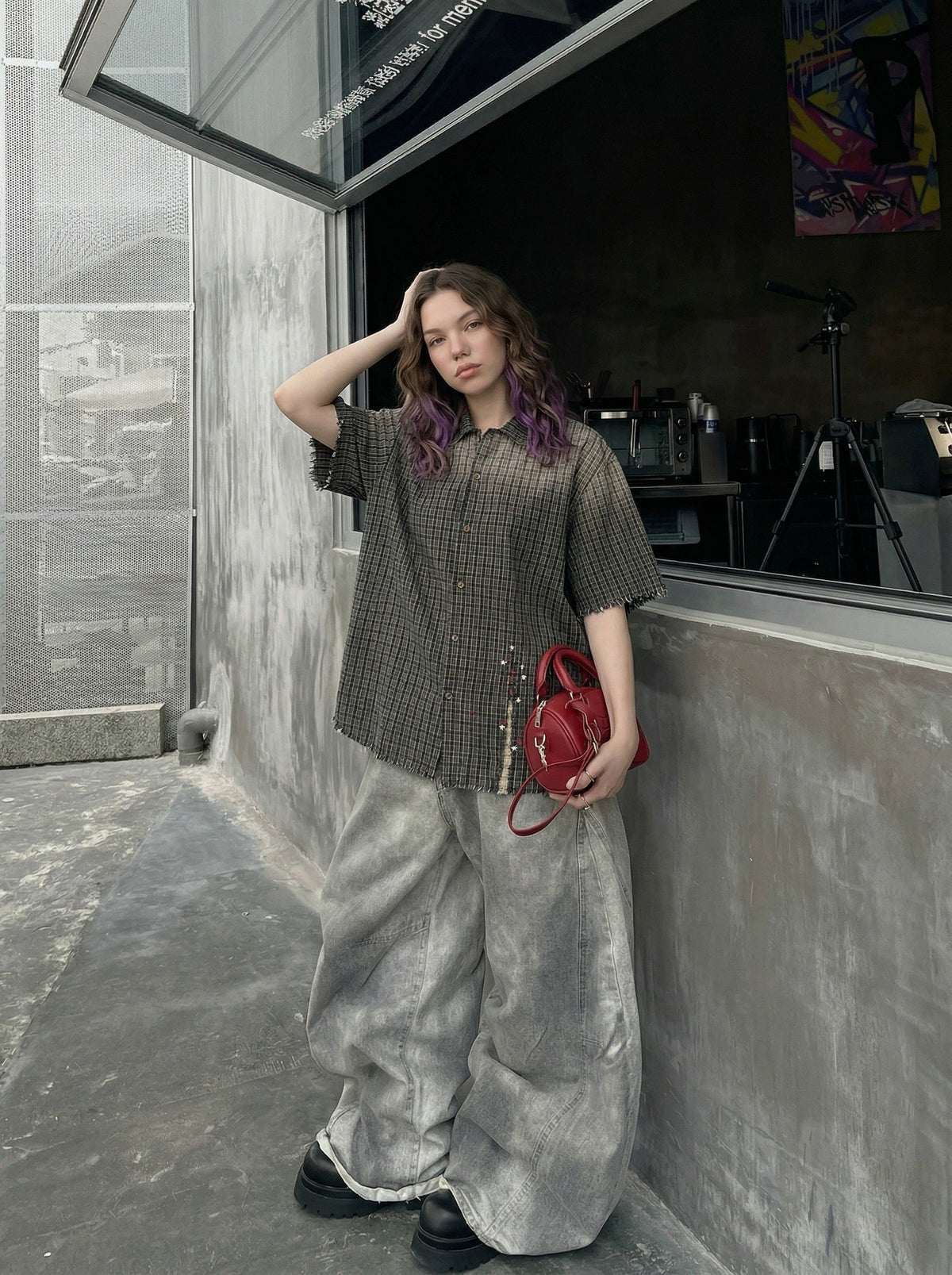 DAXUEN Oversized plaid button-up shirt with frayed edges — model photo