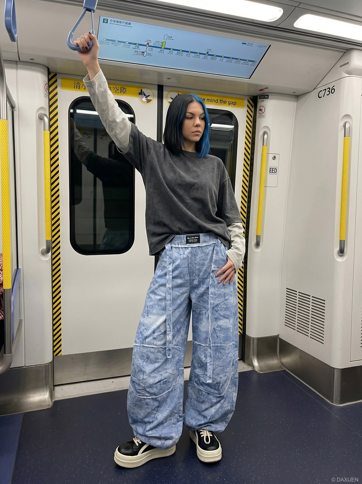 DAXUEN Oversized wide-leg pants with crinkled pattern and embroidery — model photo