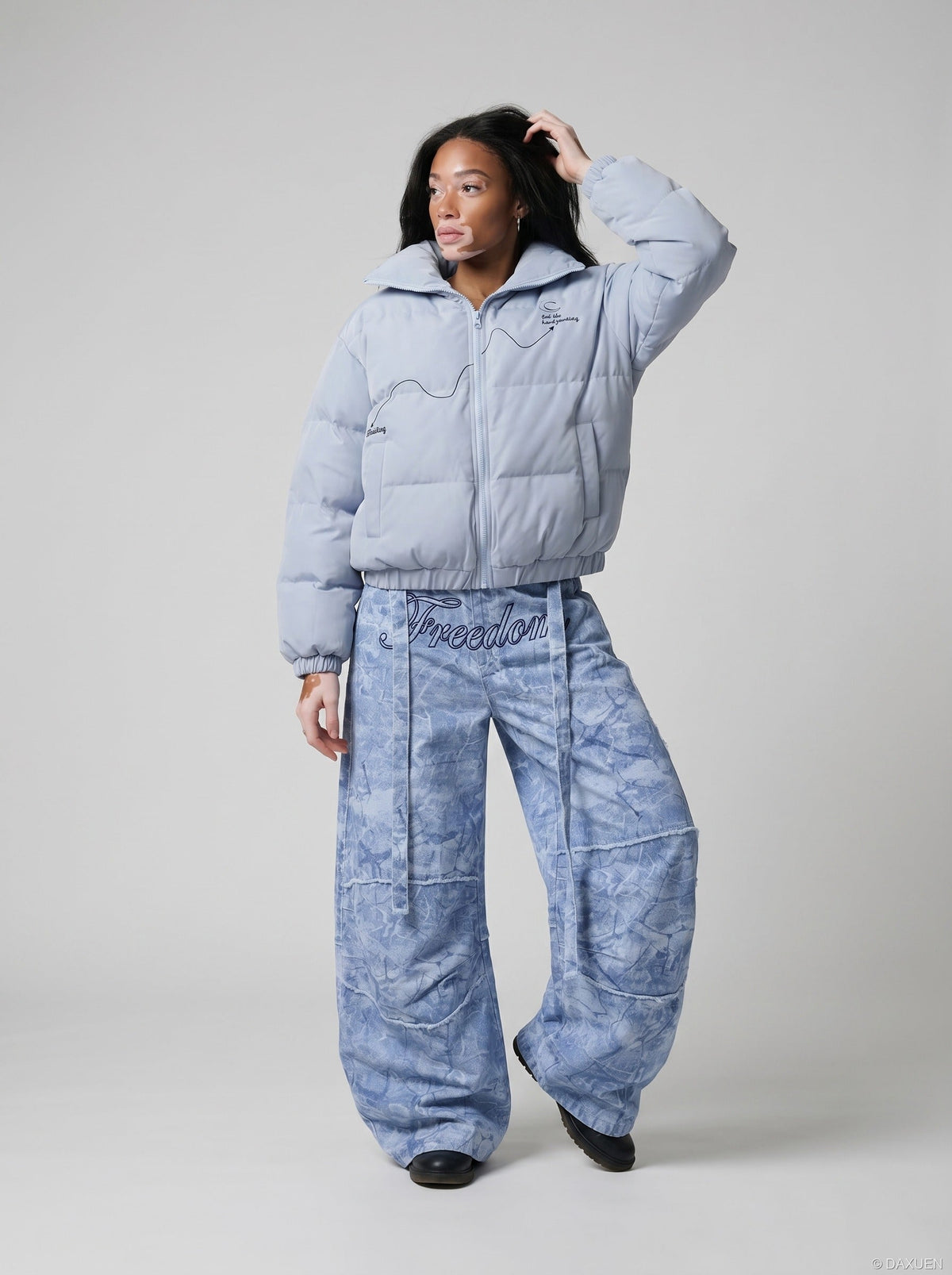 DAXUEN Oversized wide-leg pants with crinkled pattern and embroidery — model photo