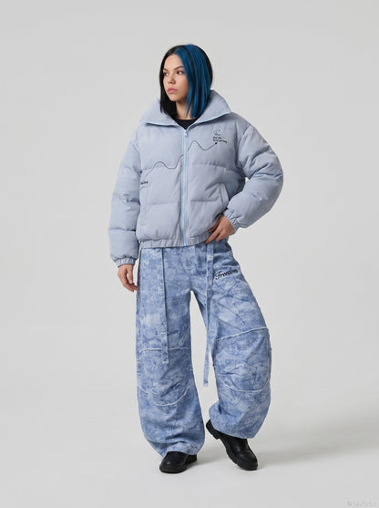 DAXUEN Oversized wide-leg pants with crinkled pattern and embroidery — model photo