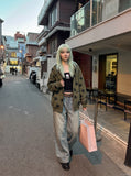DAXUEN light blue distressed wide-leg jeans with geometric paneling — model photo
