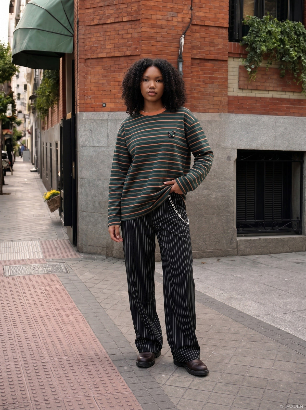 DAXUEN black oversized striped top with geometric embroidery — model photo