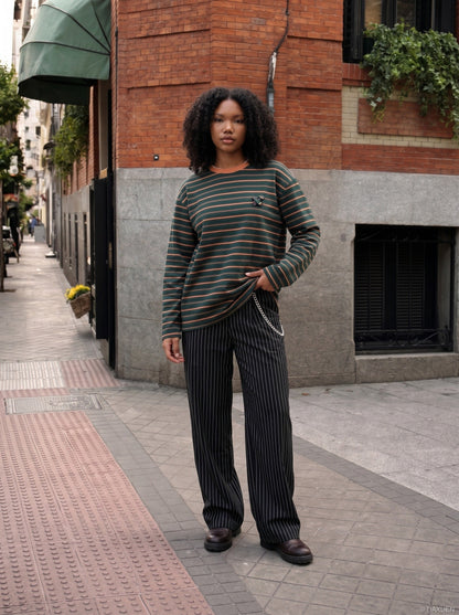 DAXUEN black oversized striped top with geometric embroidery — model photo