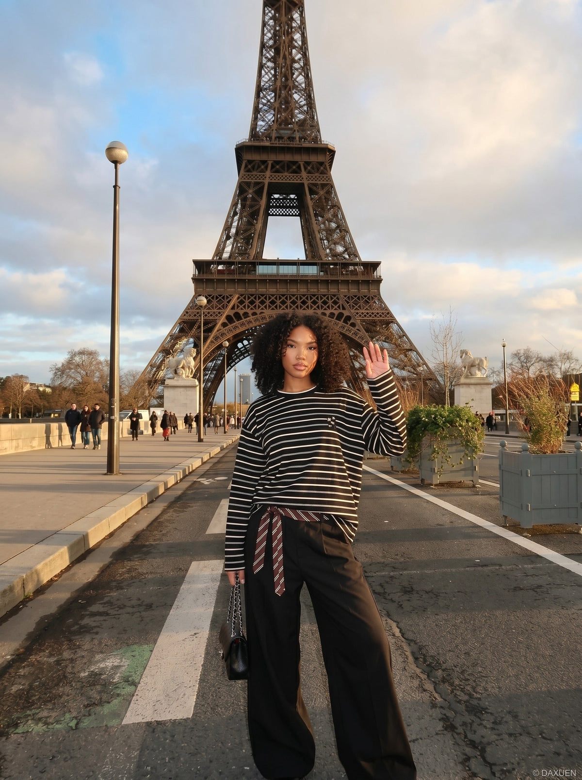 DAXUEN black oversized striped top with geometric embroidery — model photo