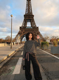DAXUEN black oversized striped top with geometric embroidery — model photo