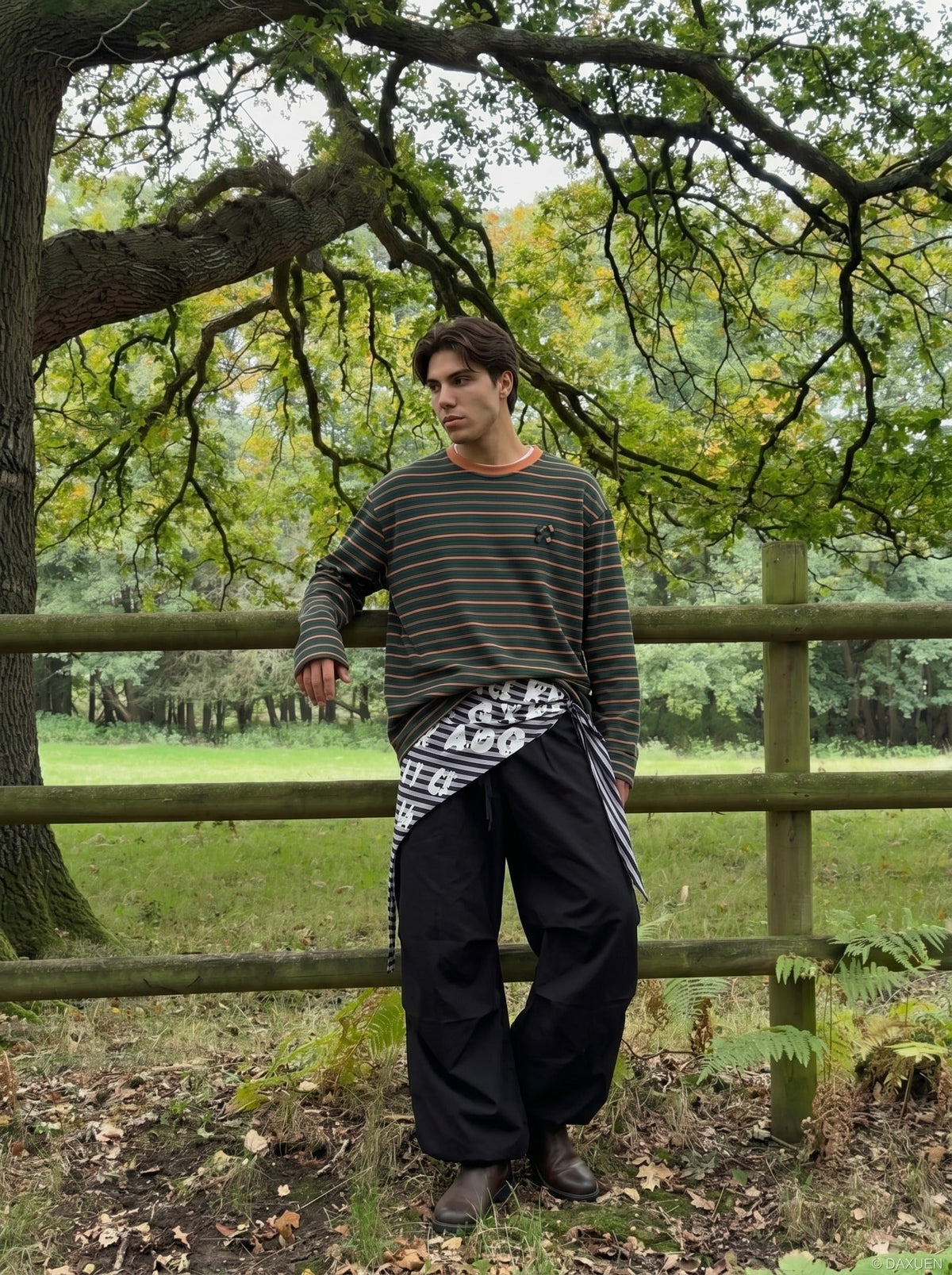 DAXUEN black oversized striped top with geometric embroidery — model photo