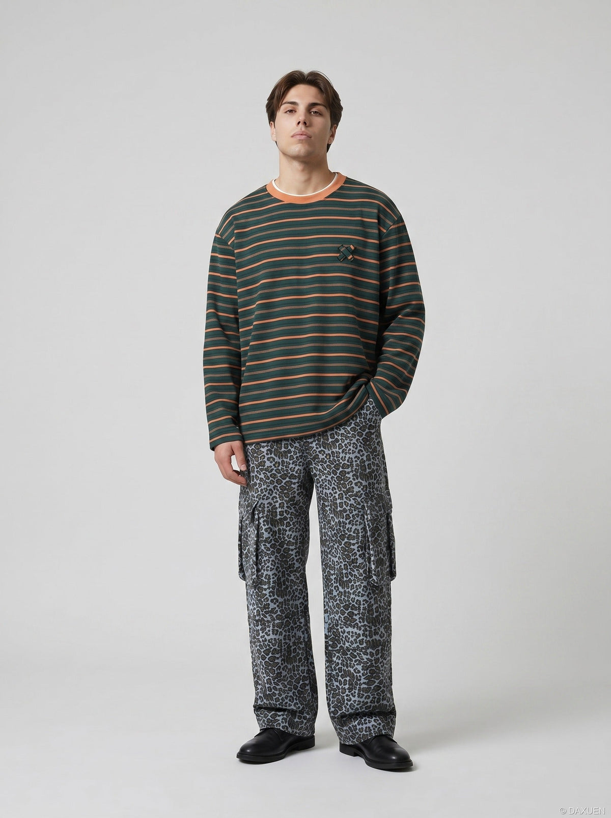 DAXUEN black oversized striped top with geometric embroidery — model photo