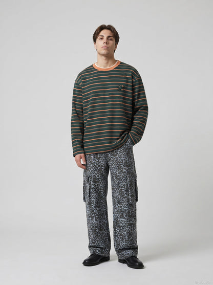 DAXUEN black oversized striped top with geometric embroidery — model photo