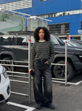 DAXUEN black oversized striped top with geometric embroidery — model photo