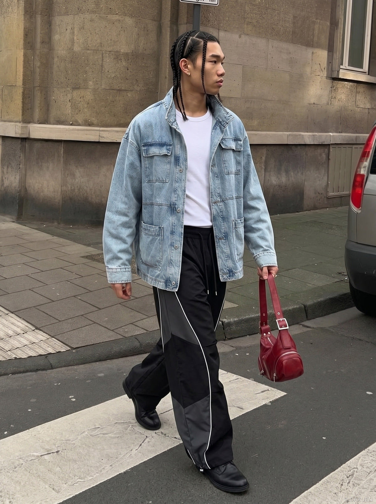 DAXUEN Wide-leg track pants with geometric color-blocked panels — model photo