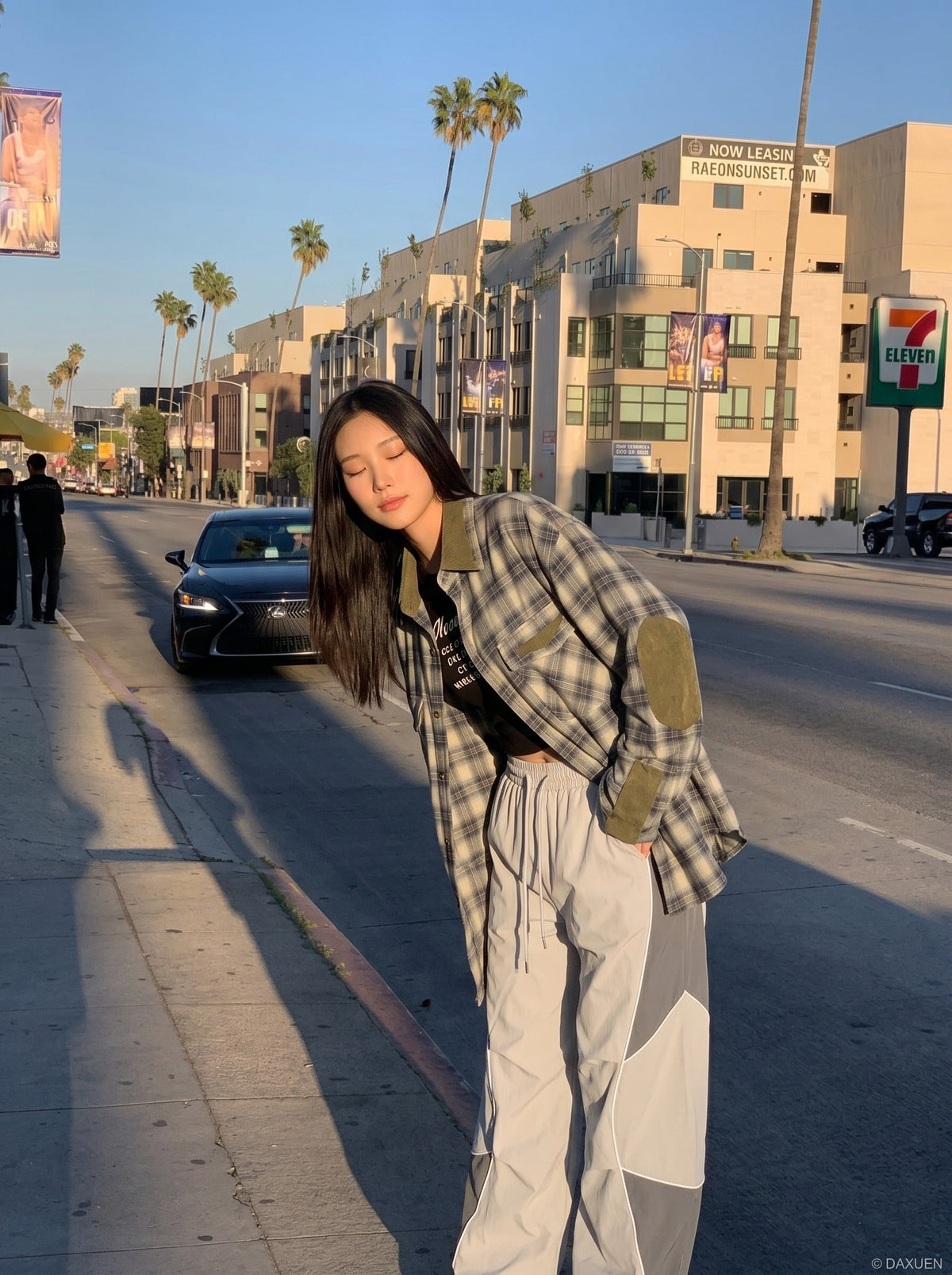 DAXUEN Wide-leg track pants with geometric color-blocked panels — model photo