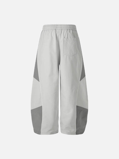 DAXUEN Wide-leg track pants with geometric color-blocked panels