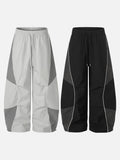DAXUEN Wide-leg track pants with geometric color-blocked panels
