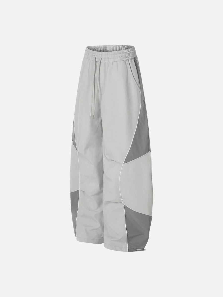 DAXUEN Wide-leg track pants with geometric color-blocked panels