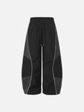 DAXUEN Wide-leg track pants with geometric color-blocked panels