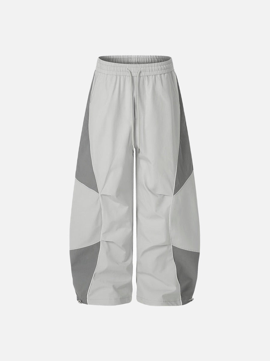 DAXUEN Wide-leg track pants with geometric color-blocked panels