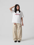 DAXUEN white oversized red geometric 'STAFFPICK' graphic tee — model photo
