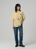 DAXUEN Gingham button-up shirt with teddy bear pendant — model photo
