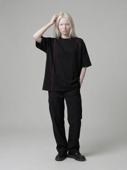 DAXUEN Glitchy text graphic short-sleeved T-shirt — model photo