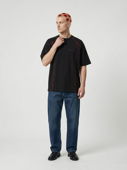 DAXUEN Glitchy text graphic short-sleeved T-shirt — model photo