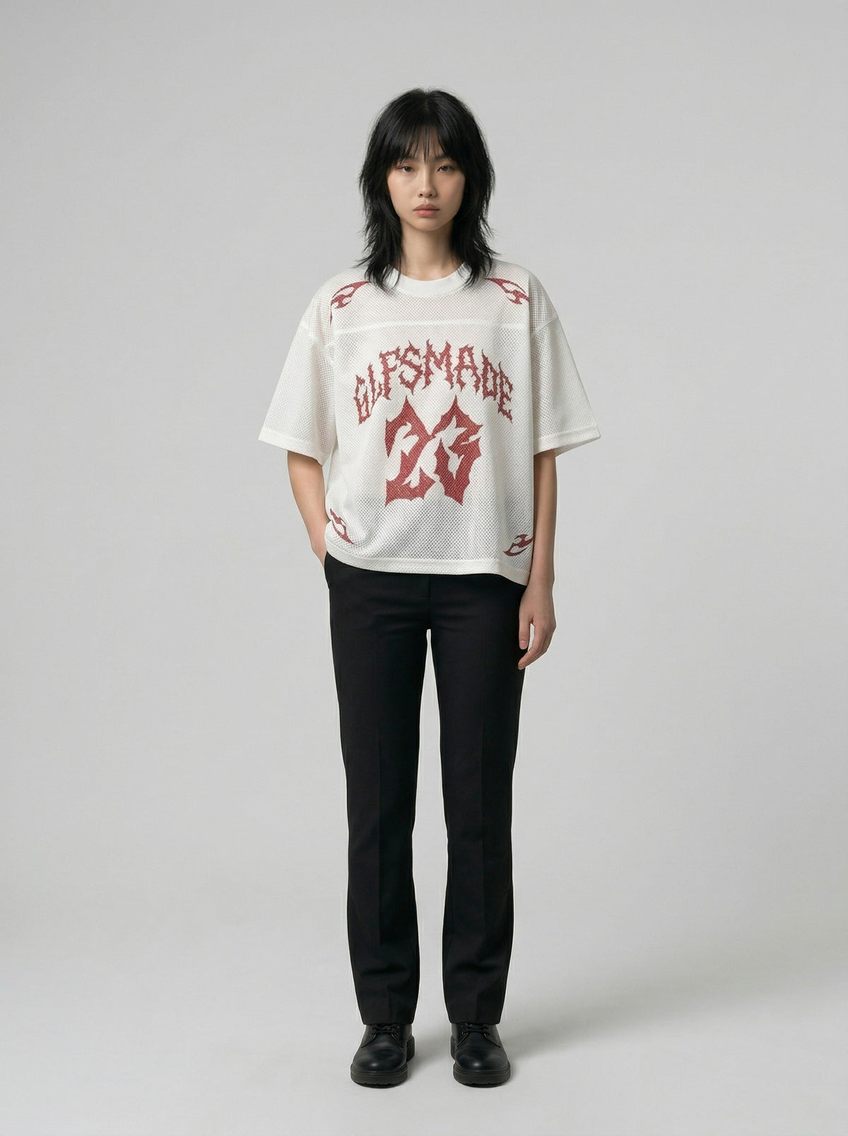 DAXUEN Oversized mesh jersey T-shirt with gothic graphics — model photo